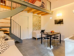 Interior Design, Flooring, Floor, Furniture, Room, Ceiling, Chair, Wood Flooring, Wood Stain, Living Room