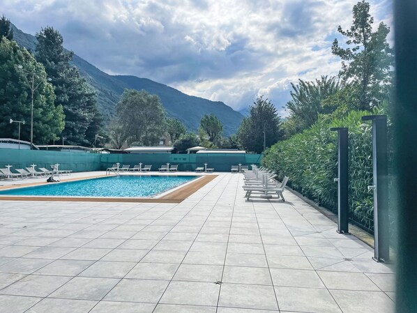 Swimming Pool, Mountain Range, Shade, Outdoor Furniture, Ridge, Alps, Evergreen