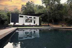 Custom pool is your magic lagoon under the oaks