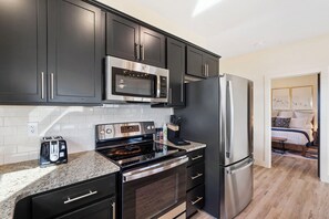 Fully stocked with pots, pans, and the essentials!