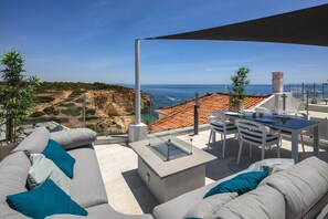 Lounge area with fire pit Casa Milhafre Benagil roof terrace