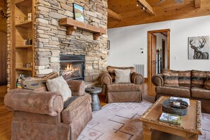 Stacked Stone Gas Fireplace and Comfortable Seating