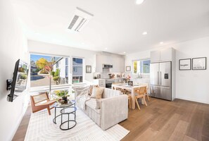 Welcome to our lovely home! Here is the open concept inviting living room.