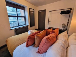 Thoughtfully designed with convenience in mind – hang your clothes and make yourself at home in our cosy bedroom.