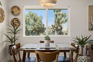 Dining area surrounded by desert landscape views