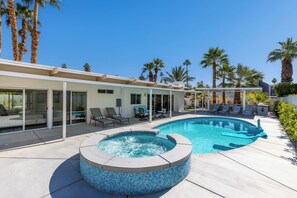 The Palm Springs sun awaits in this beautiful pool and spa