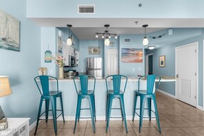 Breakfast bar attached to full kitchen