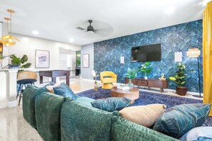 Enter the chic, open living room & stream all your favorite shows