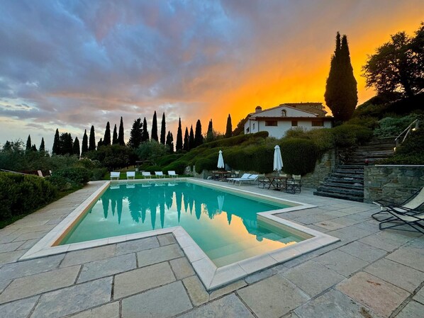 View of the pool and villa in the background