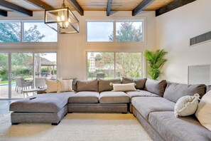 Kick back and relax on the cozy, spacious couch, perfect for lounging or enjoying your favorite shows.