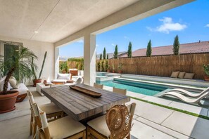 Outdoor dining area and pool