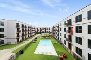 Take in stunning courtyard and pool views from your private Juliette balcony.