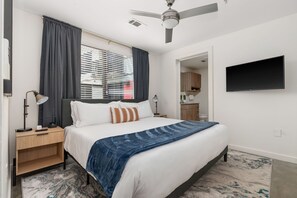 Drift off to dreamland on a memory foam bed in this cozy bedroom.