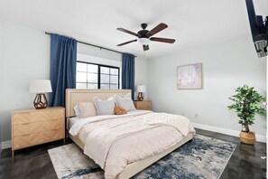 Drift into relaxation in this queen-sized bed with soothing earthy tones and ocean vibes. The perfect retreat after a sun-soaked day at Brushy Creek Trail or an adventure at Chisholm Trail Crossing Park!