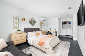 Spacious and cozy, this double-bed room with a comfy sofa is perfect for families or groups. Unwind here after cheering for the Round Rock Express at Dell Diamond or enjoying Texas BBQ at Salt Lick!