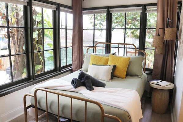 Enjoy a restful nights' sleep in our plush bedroom! Includes a memory foam cooling mattress, crisp sheets, comfortable duvet and luxurious pillows! 