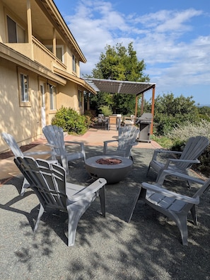 Firepit conversation with vineyard views
