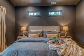 Dark and Moody Primary Bedroom (King!) - one of the reasons why this home is a Black Beauty!