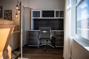 If you must work there is an office desk and chair in the living room.