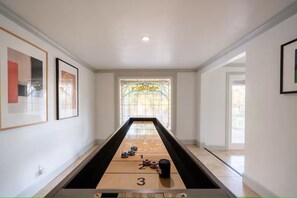 Challenge your family and friends to a game of shuffleboard!