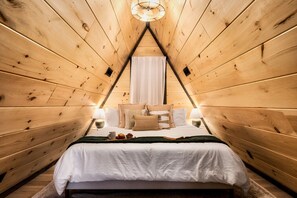 Unwind under the stars at this dreamy black A-frame in the Smoky Mountains!