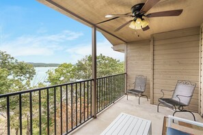 Covered Deck with Seating and a Lake Front View!