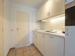 Interior Design, Flooring, Floor, Countertop, Ceiling, Kitchen, Room, Major Appliance, Cabinetry, Kitchen Sink