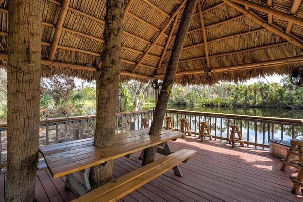 Welcome to Riverside Luau where you can gather under the tiki hut for a meal or drinks, surrounded by tranquil water views and the sounds of nature.





