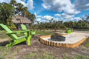 Gather around the fire pit for cozy evenings under the stars, with plenty of seating and beautiful natural surroundings..
