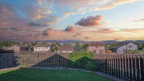 This backyard offers breathtaking mountain views, providing a peaceful backdrop for outdoor relaxation and enjoyment.
