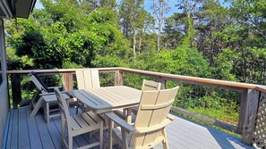Upper deck with table and chairs