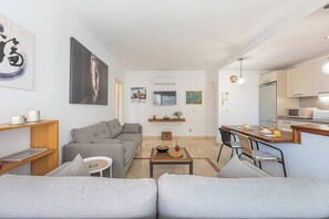Living Room: Access to the balcony, two sofas, and a sofa bed for 2. (2)