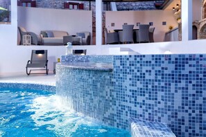  Swimming pool with waterfall