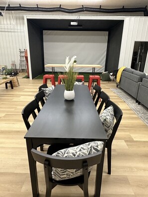 Dining for 8 + 4 high top bar seats. 