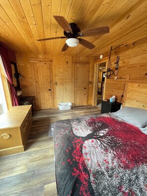 Master bedroom upstairs with river view.