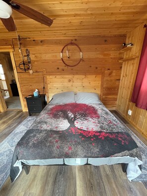 Master bedroom upstairs with river view.