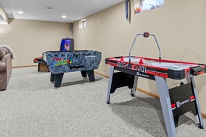Challenge your friends to a game of air hockey and enjoy some friendly competition in the game room.
