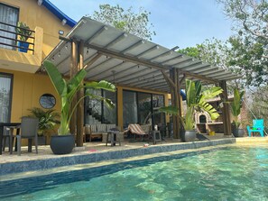 View of the covered terrace from the pool