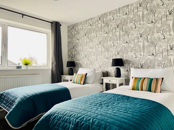 [Bedroom #1] 2 single beds