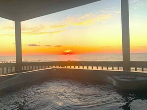 Breathtaking sunrises from the hot tub on your deck, overlooking 180° ocean views. This is the ONLY home on Surfside’s pedestrian beachfront with a HOT TUB—offering unmatched relaxation and scenery. A truly one-of-a-kind getaway right on the sand!