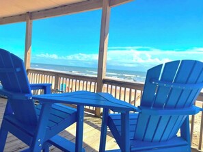 Enjoy stunning beach views from four Adirondack chairs, all in 100% shade. Relax in comfort while watching your family play on the sand and in the waves, no need to go down to stay connected. These elevated chairs provide the perfect beachside escape