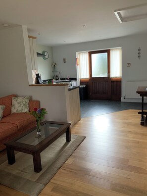 Sitting area and open plan kitchen dining room