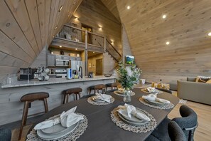 Elegant dining area w/seating for 6 and island w/seating for 4.