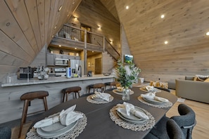 Elegant dining area w/seating for 6 and island w/seating for 4.