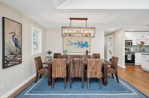 Large dining table with available leaf to accommodate up to 10.
