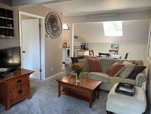 Living room with a queen sofa bed