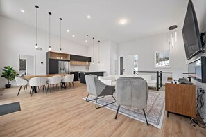 Cozy, spacious living room with comfy seating & smart TV!