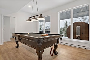 Challenge friends to a game of pool in the stylish game room!