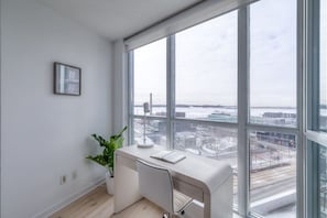 Work in style with a comfortWork in style with a comfortable desk, high-speed WiFi, and stunning city views!able desk, high-speed WiFi, and stunning city views!