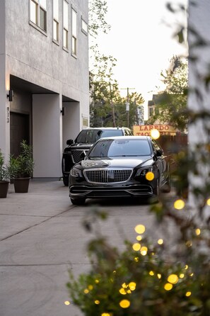 Sleek modern garages nestled in a sun-drenched courtyard. Stylish!